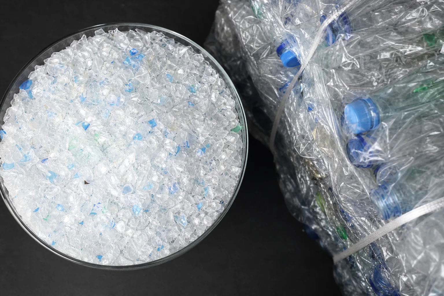 Recycled PET flakes and collected plastic bottles