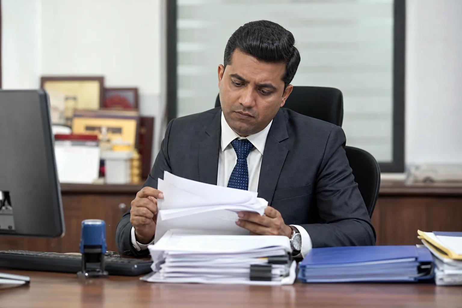 Bank officer reviewing documentary trade documents