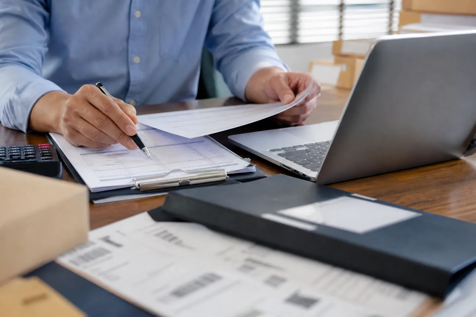 Export shipping documents and commercial invoice being prepared